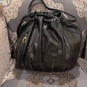 HOBO Black Leather Drawstring Shoulder Bag with Gold Hardware
